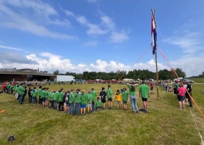 jubileumkamp opening met vlag